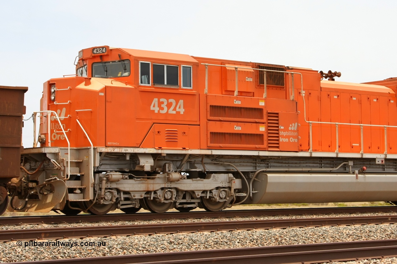 081225 0533r
Walla Siding on Christmas Day 2008, BHP Billiton Electro-Motive built SD70ACe mid train unit 4324 serial 20066862-037, this is the 'class leader' of a batch of ten SD70ACe units built for BNSF but sold to BHP Billiton following construction. Note the difference of this cab shot to the one of lead unit capable 4332.
Keywords: 4324;Electro-Motive;EMD;SD70ACe;20066862-037;BNSF-9166;