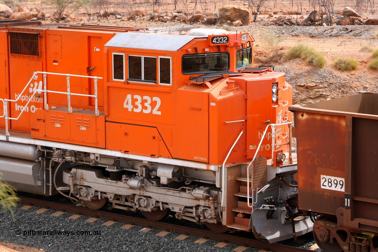 081225 0720r
Turner North on Christmas Day 2008 sees the first BHP Billiton Electro-Motive built SD70ACe 'Pumpkin' unit 4332 serial 20066862-061, originally built for BNSF, to be fitted out as a lead unit. This cab shot shows some of the external modifications to allow it to lead. In-fill step covers, second handrail, second (tropical) roof, bifurcation of main air line, AM/FM CD player-radio and removal of sun shades.
Keywords: 4332;Electro-Motive;EMD;SD70ACe;20066862-061;BNSF-9190;