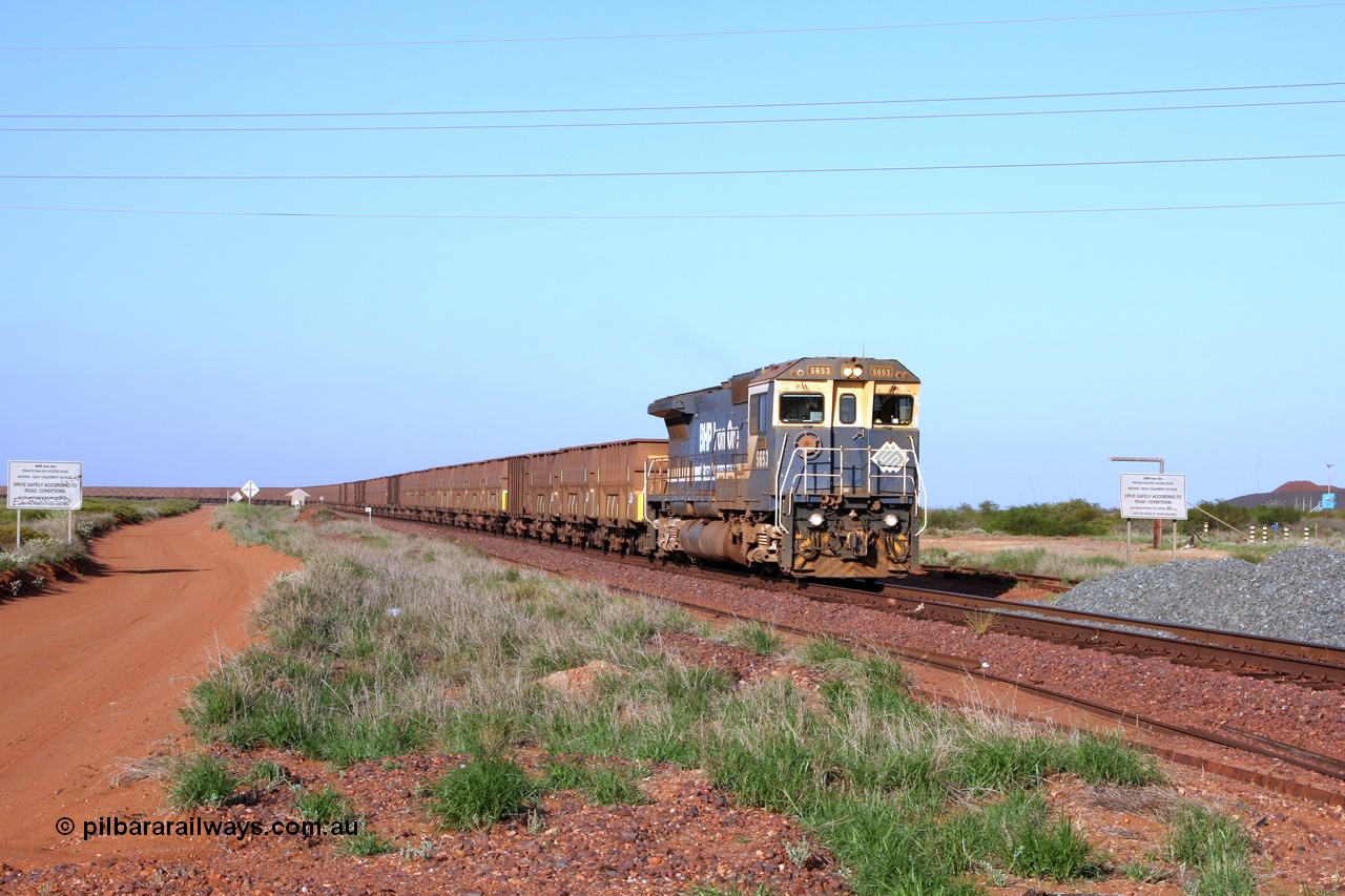 090112 0725r
Goldsworthy Junction, 19.3 km grade crossing on the GML sees BHP Goninan GE rebuild CM40-8M locomotive 5653 'Chiba' serial 8412-10 / 93-144 with an empty Yarrie train 12th January 2009.
Keywords: 5653;Goninan;GE;CM40-8M;8412-10/93-144;rebuild;AE-Goodwin;ALCo;M636C;5484;G6061-5;