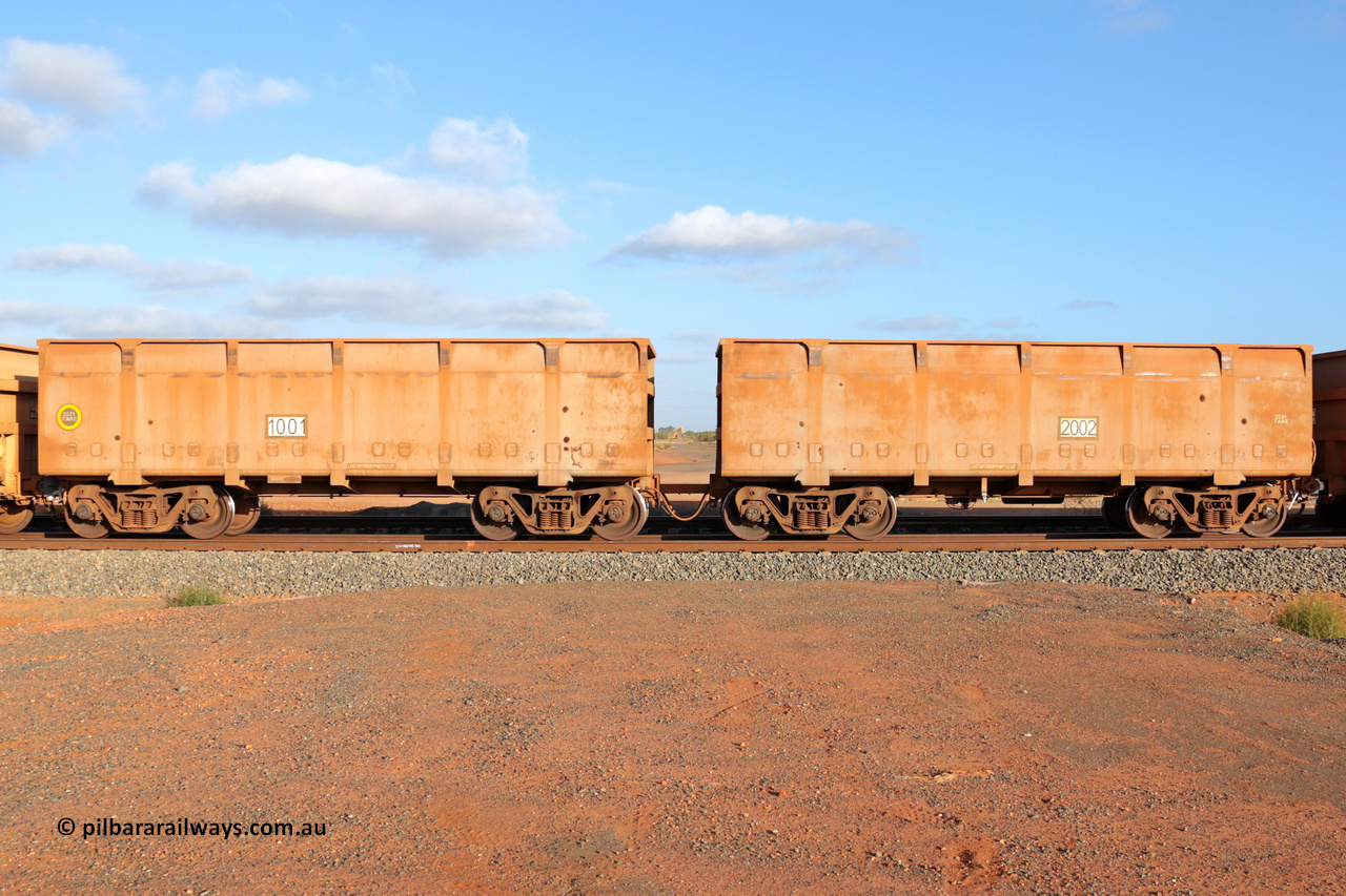 1001-2002 131126 3714
FMG 1001 and 2002 seen at Boodarie on an empty train, November 26, 2013. Original orders for 976 waggons numbered from 1001 slave and 2002 control up to 1975 slave and 2976 control built by CSR Zhuzhou Rolling Stock Works in 2007 and 2008 across two orders one for 816 waggons and the second for 160 waggons.

