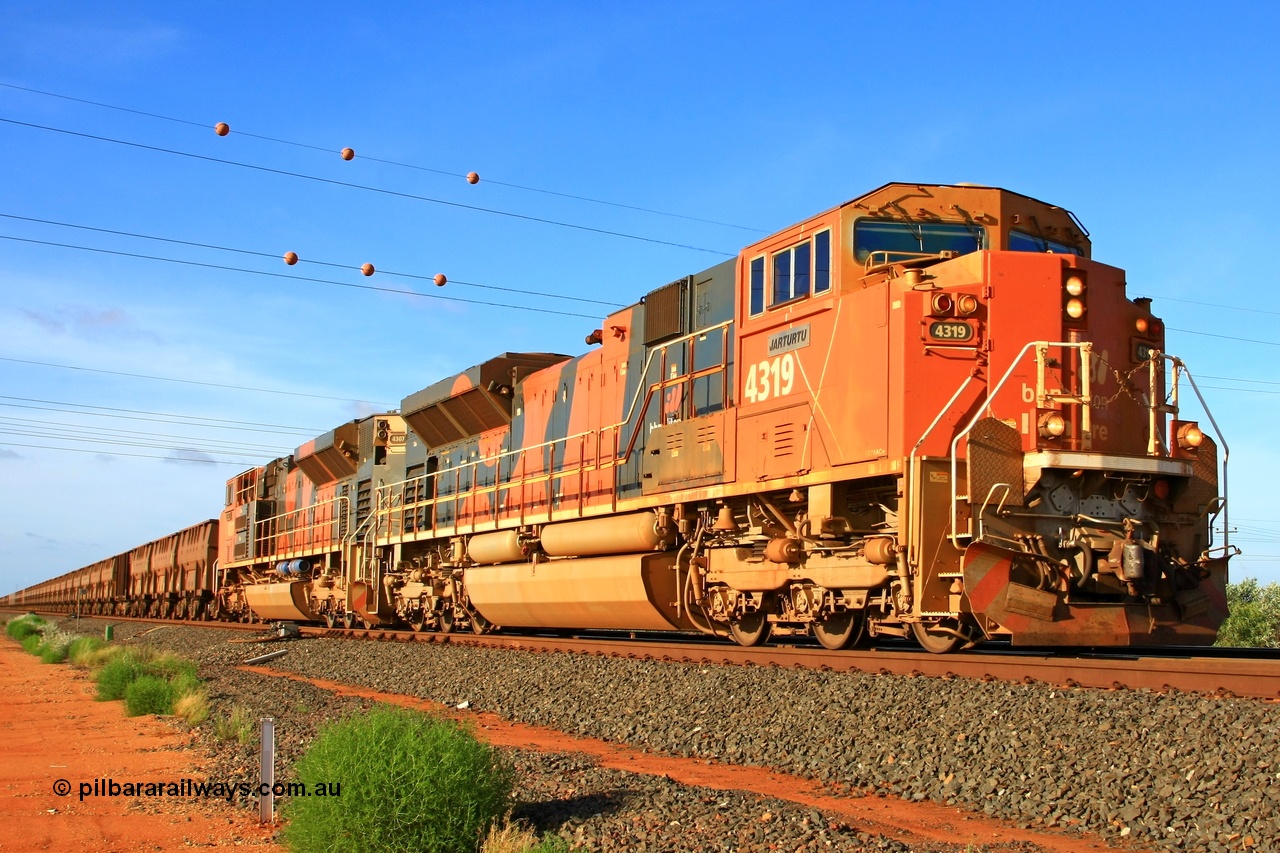 110318 9580r
Goldsworthy Junction, BHP Billiton 4319 'Jarturtu' serial 20058712-006 and EMD SD70ACe/LC built in London Ontario by Electro-Motive in the second order of units for BHP. The unit is heading up an empty train on the 'Avoidance Road' with second unit being 4307 from the original unit order. Jarturtu is an Western Desert Aboriginal word for tree or gum tree. 18th March 2011.
Keywords: 4319;Electro-Motive-London-Ontario;EMD;SD70ACe/LC;20058712-006;