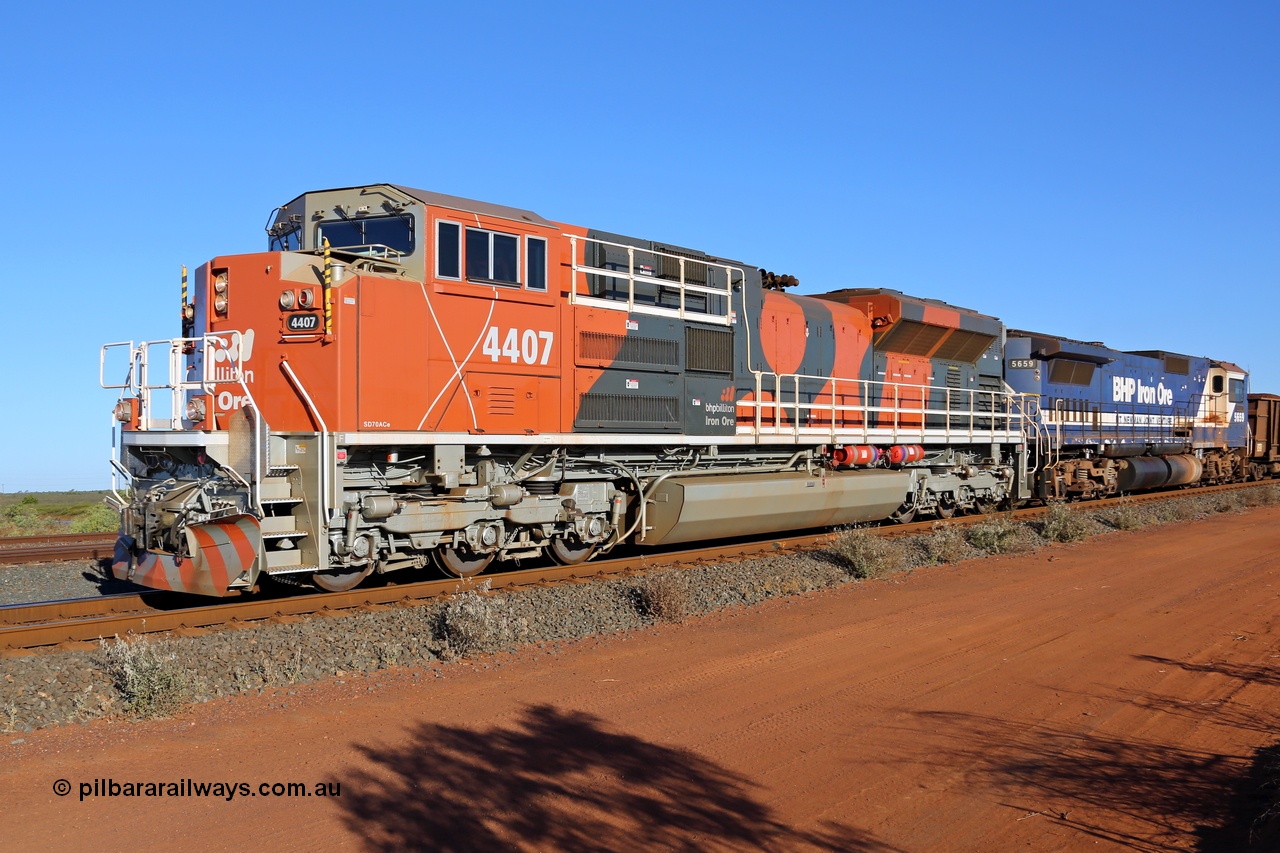 130720 1872r
Goldsworthy Junction on the Avoidance Road is another loaded bound for Finucane Island behind 4407 serial 20118685-005 from the ninth order of twelve EMD SD70ACe/LCi units built by Progress Rail Muncie. They are the second order to feature the hinged top rail for the front step area. The second unit is an CM40-8M 5659 with less than two years left before it was scrapped. 20th July 2013.
Keywords: 4407;Progress-Rail-Muncie-USA;EMD;SD70ACe/Lci;20118685-005;