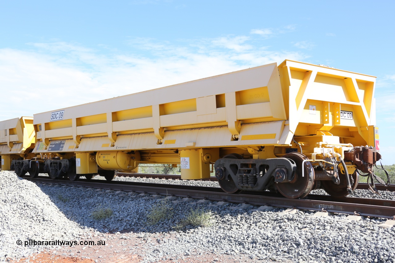 130815 2574
Barker Siding, FMG has ten 82.4 tonne capacity air operated side dump waggons built in USA by JK-CO in 2012. SDC 09 sits at the ballast loading point. 15th August 2013.
Keywords: SDC09;JK-CO-USA;FMG-ballast-waggon;