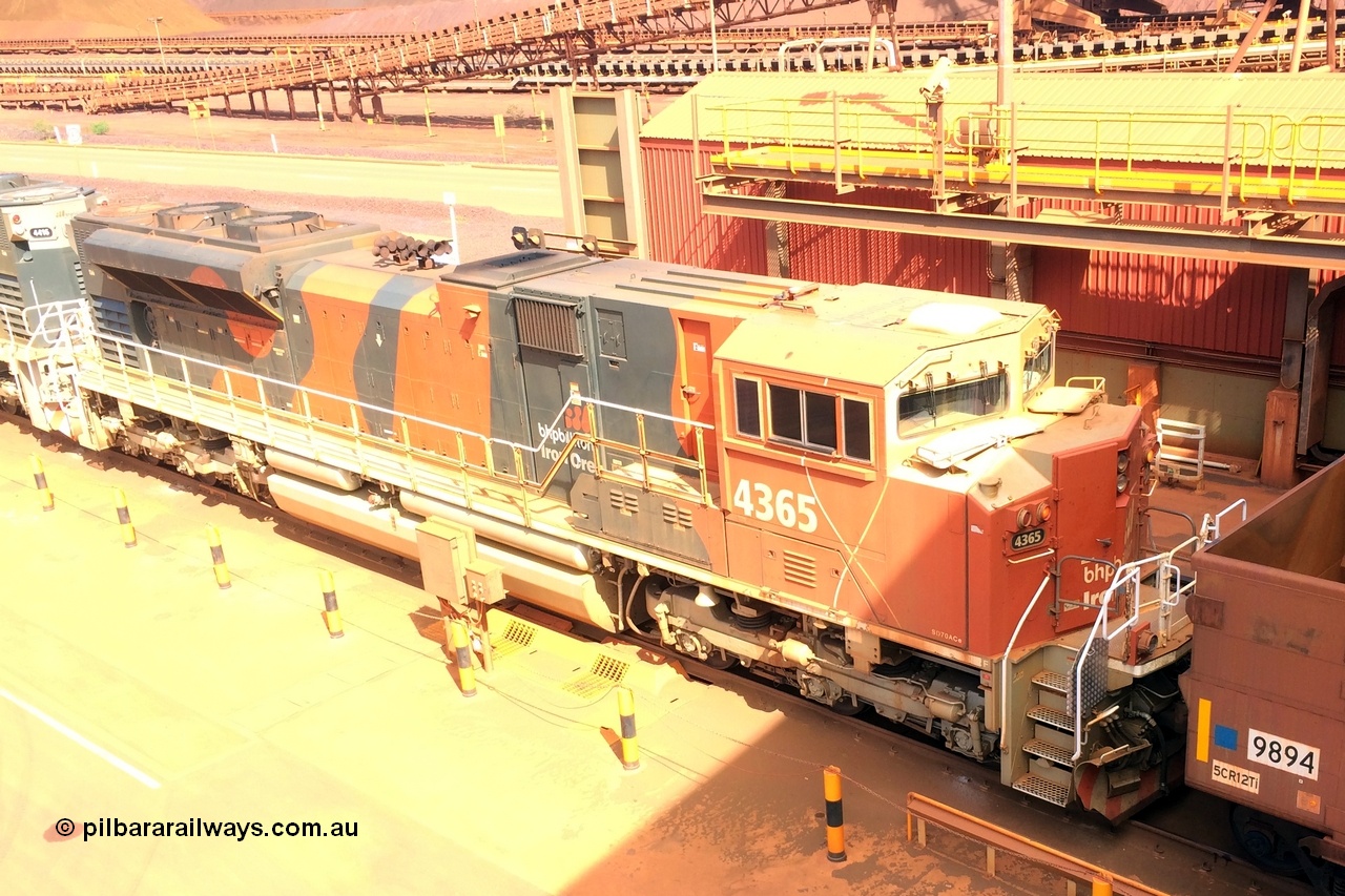 140202 0448r
Nelson Point at Car Dumper One, in the process of dumping this view shows another modified type 'patio gate' arrangement on the front of BHP Billiton SD70ACe unit 4365 serial 20098203-010 part of an eighteen unit sixth order for EMD locomotive built at London Ontario. 2nd February 2014.
Keywords: 4365;Electro-Motive-London-Ontario;EMD;SD70ACe;20098203-010;