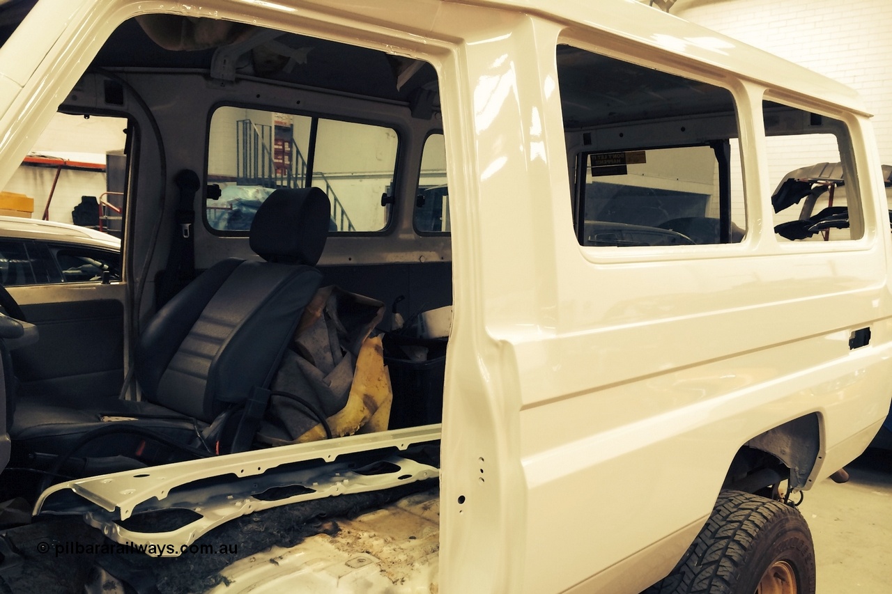 140603 0698r
Here's the Troopy at the panel shop with a complete new LHS panel, that's the new fender and mudguard inside the car. June 2014.
