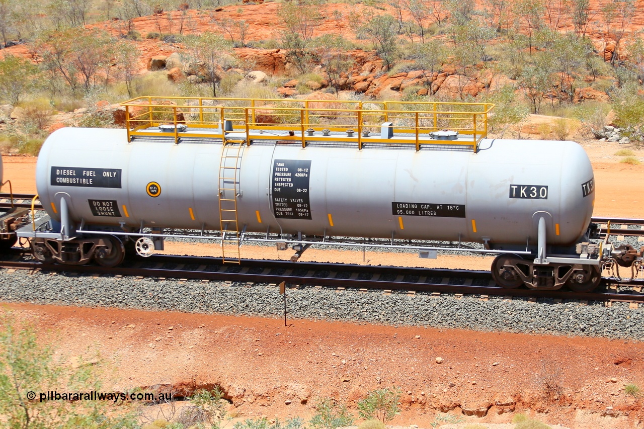 141126 7252r
Kanga at the 105 km, the final member of FMG's thirty strong fleet of tank waggons TK 30, 95,000 litre capacity built in China by CSR at the Zhuzhou Rolling Stock Works. 26th November 2014.
Keywords: TK30;CSR-Yangtze-Rolling-Stock-Co-China;FMG-tank-waggon;