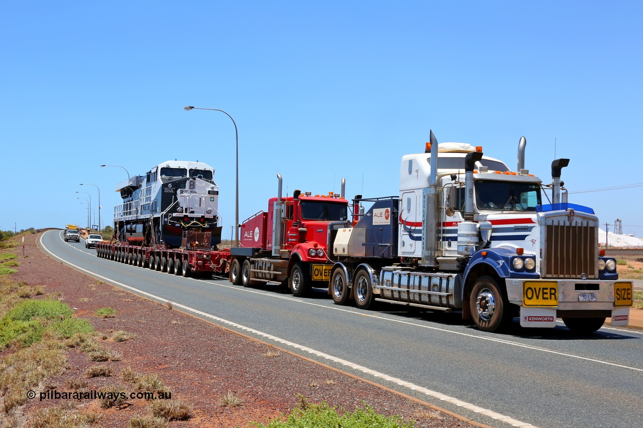 150129 7482
Redbank, running off the bridge over competitor BHP's railway Roy Hill's General Electric built ES44ACi unit RHA 1013 serial 62585 being delivered behind two ALE Kenworth prime movers. 29th January 2015.
Keywords: RHA-class;RHA1013;GE;ES44ACi;62585;