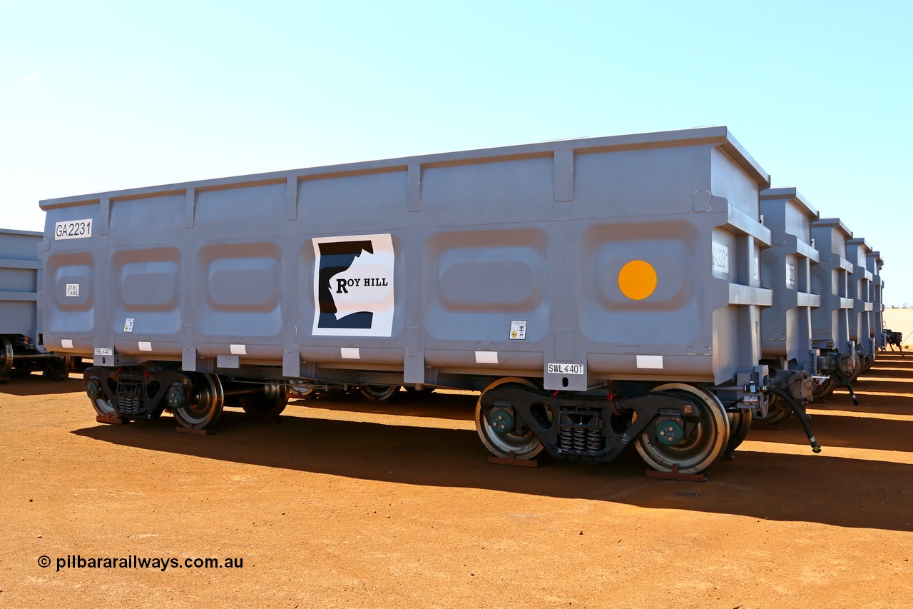 150314 7807
Wedgefield, stowed in a yard awaiting more rail to be laid, Roy Hill rotary tip 70m³ capacity ore waggon GA 2231 built by China Southern Rail in Zhuzhou China. The yellow circle indicating the rotary coupler end. 14th March 2015.
Keywords: GA2231;China-Southern-Rail;