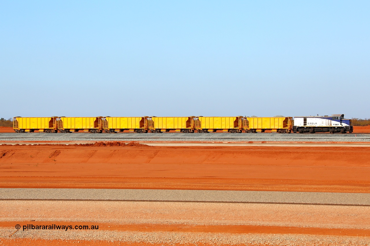 150412 7909
Boodarie, Roy Hill Tad Yard under construction with an ex-Victorian Railways T class in the Pilbara, who would've thought?! Now owned by CFCLA T class T 387 a Clyde Engineering EMD model G8B serial 65-417 with CFCLA ballast cars. 12th April 2015. [url=https://goo.gl/maps/bV8Ox]View map here[/url].
Keywords: T-class;T387;Clyde-Engineering-Granville-NSW;EMD;G8B;65-417;