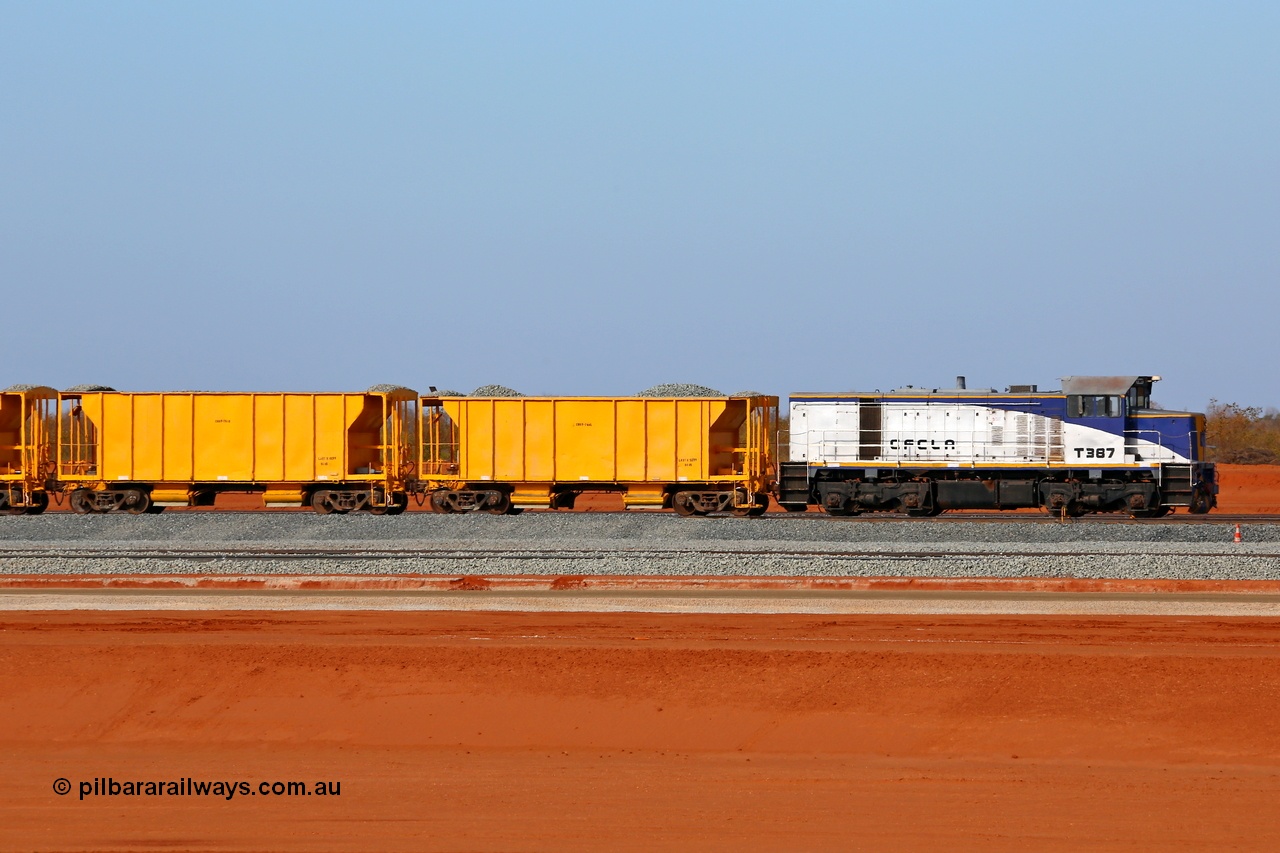 150412 7910
Boodarie, Roy Hill Tad Yard under construction with an ex-Victorian Railways T class in the Pilbara, who would've thought?! Now owned by CFCLA T class T 387 a Clyde Engineering EMD model G8B serial 65-417 with CFCLA ballast cars. 12th April 2015. [url=https://goo.gl/maps/bV8Ox]View map here[/url].
Keywords: T-class;T387;Clyde-Engineering-Granville-NSW;EMD;G8B;65-417;