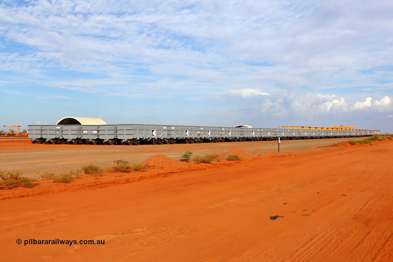 150412 7911
Boodarie, Roy Hill rotary tip 70m³ capacity waggons stored on the ground adjacent to their Flash Butt facility. 12th April 2015. [url=https://goo.gl/maps/0YODT]View map here[/url].
Keywords: China-Southern-Rail;