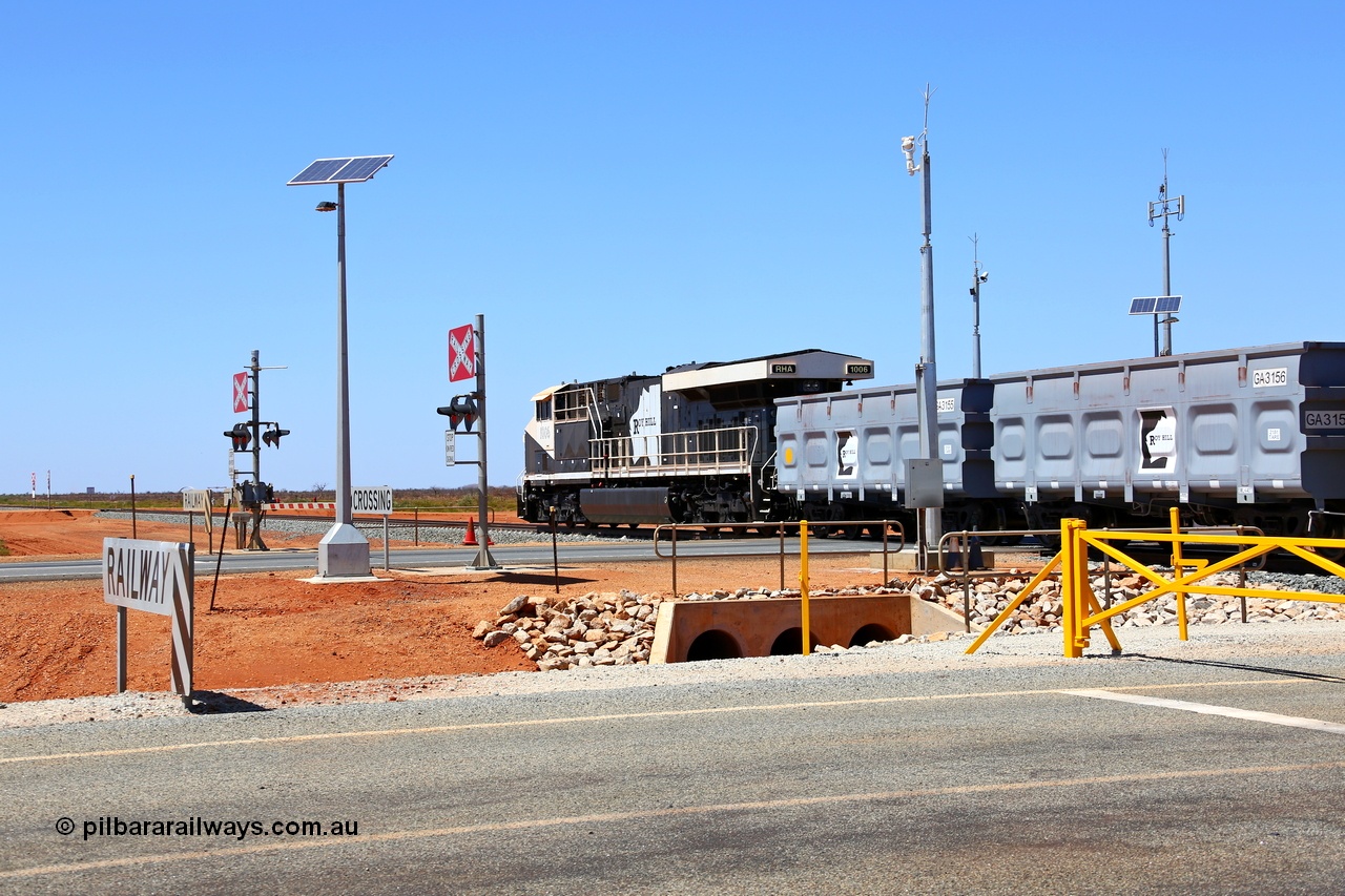 160319 1914
Great Northern Hwy, 18.2 km grade crossing, Roy Hill empty train #96 with General Electric built ES44ACi unit RHA 1006 serial 62578 leading 116 ore waggons with a mid-train unit visible then another 116 ore waggons. 16th March 2016. [url=https://goo.gl/maps/nEXZaaAHHa12]View map here[/url].
Keywords: RHA-class;RHA1006;GE;ES44ACi;62578;