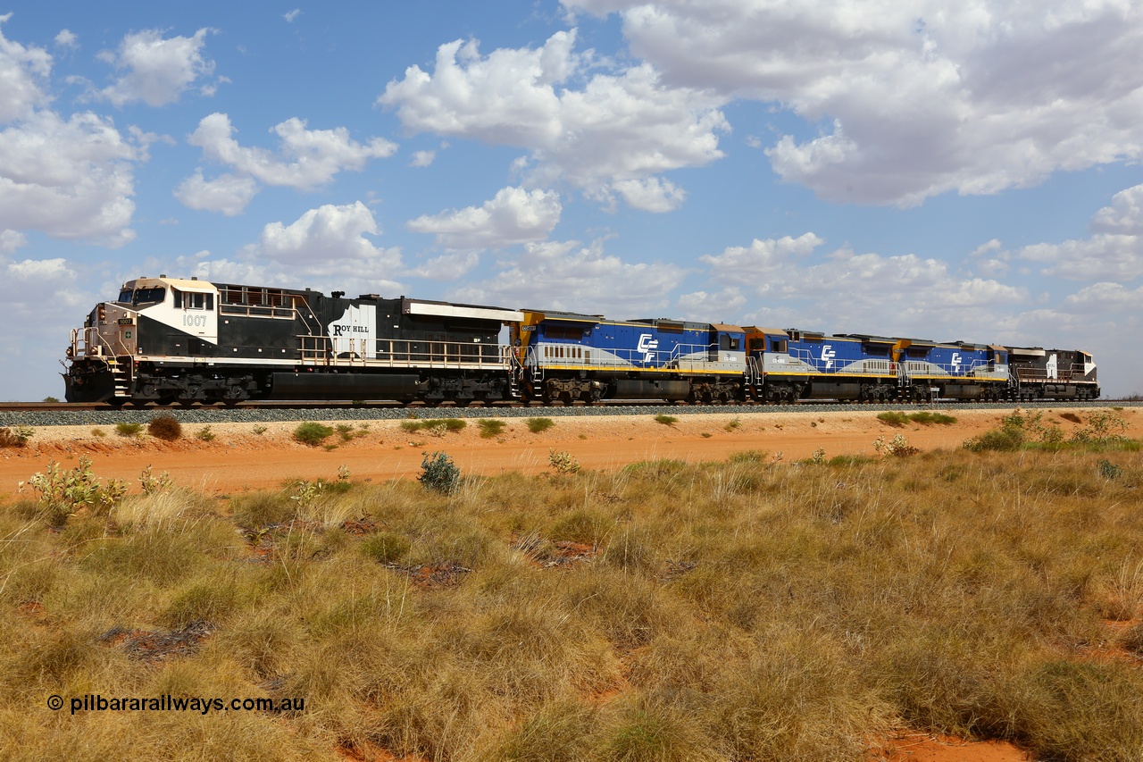 171222 1129
Ballast Spur A, Roy Hill's General Electric built ES44ACi units RHA 1007 serial 62579 and RHA 1020 cover the three CFCLA Goninan ALCo to GE rebuild units CM40-8M CD 4301, CD 4302 and CD 43031 during mainline load testing of the three lease units. 22nd December 2017.
Keywords: RHA-class;RHA1007;GE;ES44ACi;62579;