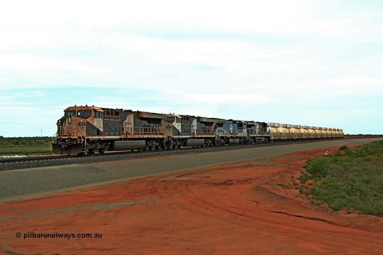 180117 1145r
Great Northern Highway, 18.2 km grade crossing sees Roy Hill loaded fuel train with General Electric built ES44ACi units RHA 1018 serial 63829 leading RHA 1019, CFCLA lease unit Goninan ALCo to GE rebuild CM40-8M unit CD 4302 and RHA 1013 with eleven loaded fuel tank waggons. CD 4302 is the only unit powering as it was being tested. 17th January 2018.
Keywords: RHA-class;RHA1018;GE;ES44ACi;63829