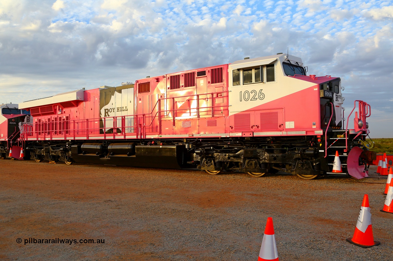 180918 0227r
Boodarie, about the 23 km at Roy Hill Rail Construction Yard, brand new Roy Hill RHA class loco RHA 1026 with serial 64743 a GE Fort Worth built GE model ES44ACi in the special Breast Cancer Awareness livery undergoes commissioning prior to official handover. All five were built at General Electric's Fort Worth Texas plant. 18th September 2018. 
[url=https://goo.gl/maps/57fPumfasGv]GeoData[/url].
Keywords: RHA-class;RHA1026;64743;GE-Fort-Worth;GE;ES44ACi