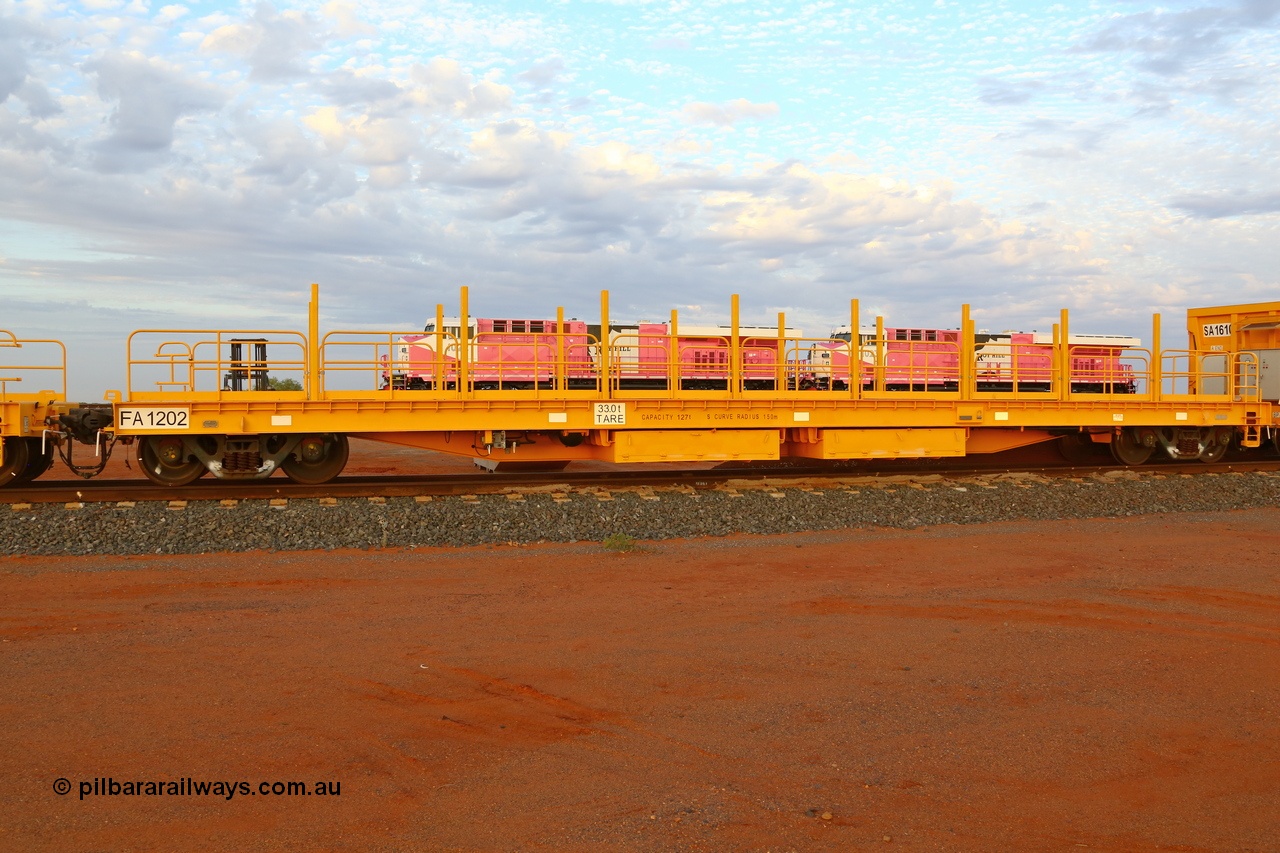 180918 0252r
Roy Hill flat / rail waggon, FA type FA 1202 with a capacity of 127 tonnes and a tare of 33 tonnes, one of five units built by CSR Yangtze Rolling Stock Co in China in 2015. Seen here in the rail construction yard. 18th September 2018.
Keywords: FA-type;FA1202;CSR-Yangtze-Rolling-Stock-Co-China;Roy-Hill-flat-waggon