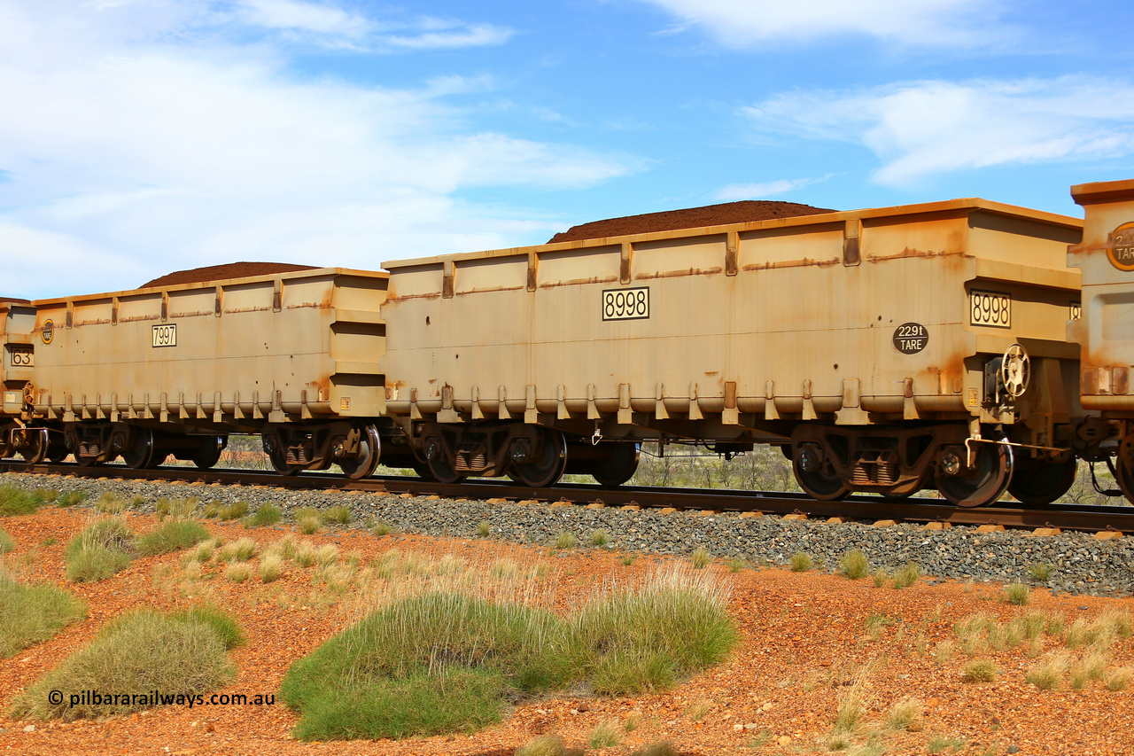 7997-8998 210511 1176
FMG 7997 and 8998 on an loaded train at Chapman Siding, May 11, 2021. 148 waggons numbered from 7851 slave and 8852 control, up to 7997 slave and 8998 control built by CRRC Yangtze between 2018 and 2020 with the ribbed body style.
