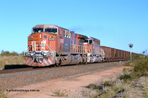 040810 162642r
Abydos Siding, BHP Billiton GE AC6000 6076 'Mt Goldsworthy' serial 51068 leads an all bubble paint quin consist on the main with EMD SD40R 3091 serial 31496 originally Southern Pacific SD40 SP 8415 and mid train units CM40-8M 5636 leading newly delivered SD40R units 3095 and 3096 10th August 2004.
Keywords: 6076;GE;AC6000CW;51068;