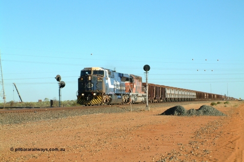 040811 161635r
Goldsworthy Junction, BHP GE AC6000 class leader 6070 'Port Hedland' serial 51062 runs through the junction leading EMD model SD40R unit 3089 serial 31512 formally Southern Pacific SD40 SP 8431 with a loaded Yandi train 11th August 2004.
Keywords: 6070;GE;AC6000;51062;