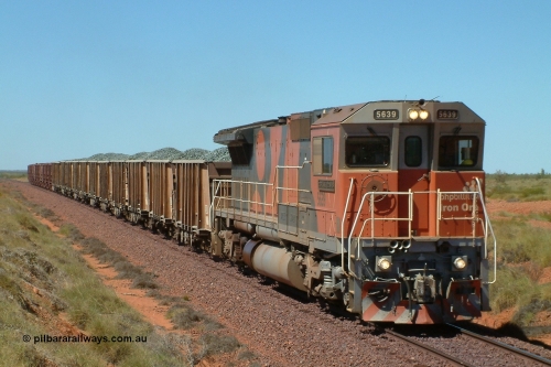 040812 123214r
Yarrie line 148 km, east of Taplin, BHP Billiton Goninan GE rebuild CM40-8M 5639 'Corunna Downs' serial 8281-03/92-128 works a 'mixed' of 12 ballast and 10 loaded GML waggons towards Hedland following a derailment further out near the Yarrie Mine, 1230 hrs 12th August 2004.
Keywords: 5639;Goninan;GE;CM40-8M;8281-03/92-128;rebuild;AE-Goodwin;ALCo;C636;5459;G6027-3;