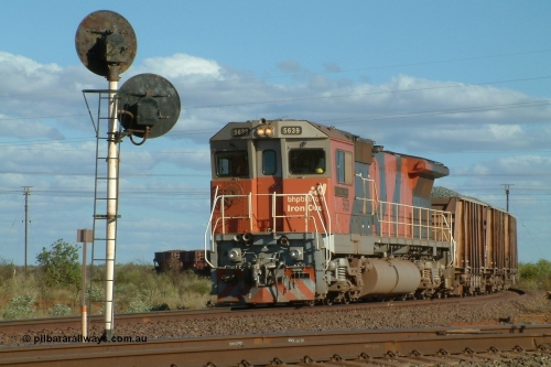 040812 155940r
Goldsworthy Junction BHP Billiton Goninan GE rebuild CM40-8M 5639 'Corunna Downs' serial 8281-03/92-128 is on the Yarrie line with a mixed ballast and loaded ore train awaiting a Pilot to come out from Hedland to pilot the train into Nelson Point yard at 1600 hrs 12th August 2004.
Keywords: 5639;Goninan;GE;CM40-8M;8281-03/92-128;rebuild;AE-Goodwin;ALCo;C636;5459;G6027-3;