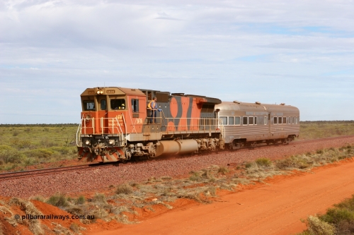 050624 3237
Allan Siding, 45 km on the GML sees BHP Billiton Goninan GE rebuilt model CM40-8M unit 5636 'Munda' serial 8151-11 / 91-122 leads the Sundowner on its way to Goldsworthy raising the dust running along the resleepered and tamped section 24th June 2005.
Keywords: 5636;Goninan;GE;CM40-8M;8151-11/91-122;rebuild;AE-Goodwin;ALCo;C636;5462;G6035-3;
