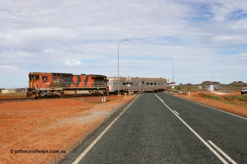 050624 3268
Broome Rd grade crossing at the 57.1 km on the GML sees BHP Billiton Goninan GE rebuilt model CM40-8M unit 5636 'Munda' serial 8151-11 / 91-122 leads the Sundowner on its way to Goldsworthy across the highway 24th June 2005.
Keywords: 5636;Goninan;GE;CM40-8M;8151-11/91-122;rebuild;AE-Goodwin;ALCo;C636;5462;G6035-3;