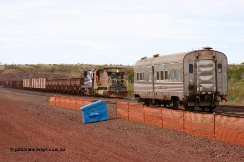 050624 3368
Goldsworthy Siding 110.8 km on the GML sees BHP Billiton Goninan GE rebuilt model CM40-8M unit 5636 'Munda' serial 8151-11 / 91-122 leading long end on a loaded Yarrie ore train assisting CM40-8 5646 past the Sundowner 24th June 2005. 
Keywords: 5636;Goninan;GE;CM40-8M;8151-11/91-122;rebuild;AE-Goodwin;ALCo;C636;5462;G6035-3;