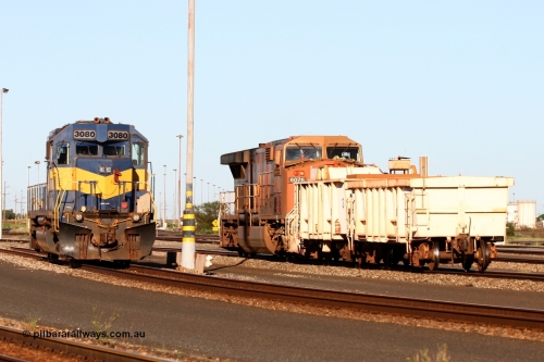 060414 3465r
Nelson Point, BHP Billiton yard pilot locos EMD SD40 3080 serial 33674 frame 7083-4 originally Southern Pacific SD40 SP 8482 and only 3000 hp shares the yard with GE AC6000 6076 'Mt Goldsworthy' serial 51068 and at 6000 hp is double 3080's size, between shunts 15th April 2006.
Keywords: 3080;EMD;SD40;33674/7083-4;SP8482;