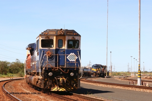 060415 3450r
Nelson Point yard, BHP Goninan GE rebuild CM40-8M 5659 'Kobe' serial 8412-04 / 94-150 with a rake of loaded 100 kL fuel waggons waiting access to shunt for the evening departure and Yard Pilots EMD SD40 units 3080 and 3091 15th April 2006.
Keywords: 5659;Goninan;GE;CM40-8M;8412-04/94-150;rebuild;AE-Goodwin;ALCo;M636C;5483;G6061-4;