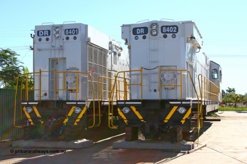 070501 9016r
Wedgefield, sitting in Asset Kinetics yard waiting to start construction duties are two of the four GTSA rebuilt DR class units. Comeng WA ALCo rebuild C636R model DR 8401 'Jean' serial WA143-1 and ex Robe River ALCo #9426 original serial 3499-02 and Comeng WA ALCo rebuild C636R model DR 8402 'Margaret' serial WA135 / C6011-02 and ex Hamersley Iron C636 #3007 with the differences between the Phase II and Phase III radiators of the Comeng WA ALCo rebuild models evident. 1st May 2007.
Keywords: DR-class;DR8401;Comeng-WA;C636R;WA143-1;9426;rebuild;ALCo;Schenectady-NY;C636;Conrail;6782;3499-3;