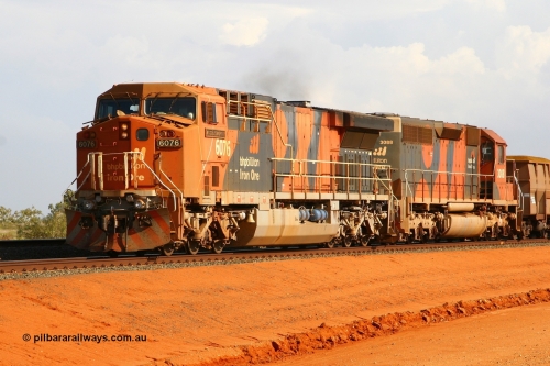 080124 1684r
Bing Siding, BHP Billiton GE AC6000 locomotive 6076 'Mt Goldsworthy' serial 51068 leads a loaded train with an SD40R in trail 24th January 2008. 6076 was the first AC6000 to be repainted in the 'earth' livery back in September 2003 and slight differences can be noticed between this units' livery and that applied to 6070 and 6075.
Keywords: 6076;GE;AC6000CW;51068;