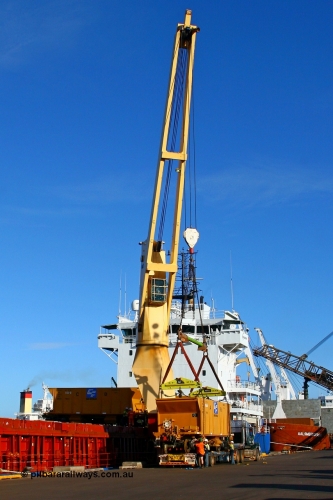 080202 1810r
Port Hedland wharf, CFCLA ballast waggon CHQY 708 B is unloaded off the vessel Kimberley Rose for road transporting to Cloud Break mine for use with TL 154 and a small ballast rake. 2nd February 2008.
Keywords: CHQY-type;CHQY708;