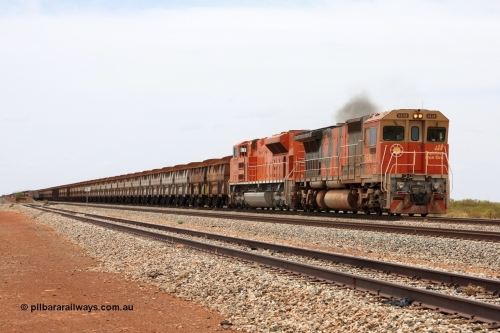 081225 0510r
Walla Siding, BHP Billiton Goninan GE rebuild CM40-8M unit 5638 'Mallina' serial 8151-11 / 91-122 powers through on the mainline with EMD SD70ACe 4325 serial 20066862-038 with a similar mid-train DPU consist on this Yandi 220 waggon loaded train bound for Port Hedland on a hazy Christmas Day 2008.
Keywords: 5638;Goninan;GE;CM40-8M;8281-02/92-127;rebuild;AE-Goodwin;ALCo;C636;5464;G6035-5;