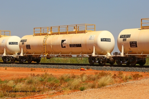 170915 0720r
Great Northern Highway 18.2 km grade crossing, Roy Hill fuel tank waggon TA 1008 one of twelve built by China Southern Rail in Zhuzhou China with a 96,000 litre capacity. 15th September 2017. [url=https://goo.gl/maps/r4Lj4cYxLBx]View map here[/url].
Keywords: TA1008;China-Southern-Rail;