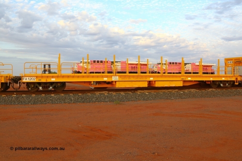 FA 1202 180918 0252
Roy Hill flat / rail waggon, FA type FA 1202 with a capacity of 127 tonnes and a tare of 33 tonnes, one of five units built by CSR Yangtze Rolling Stock Co in China in 2015. Seen here in the rail construction yard. 18th September 2018.
Keywords: FA-type;FA1202;CSR-Yangtze-Rolling-Stock-Co-China;Roy-Hill-flat-waggon