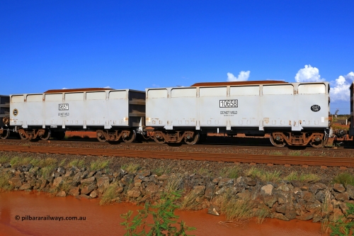 09657-10658 230309 5891
FMG 9657 and 10658 on a loaded train at Boodarie, March 9, 2023. Sixty eight waggons numbered from 9591 slave and 10592 control, up to 9657 slave and 10658 control built by CRRC Qiqihar in January and February 2022, and 9625 and higher in June 2022 with lined body stencilled DO NOT WELD and the relined date.
Keywords: 9657-10658;CRRC-Qiqihar;FMG-ore-waggon;